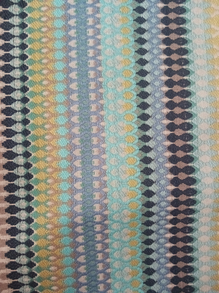 Close-up of colorful Rainbow Pillow Cover fabric