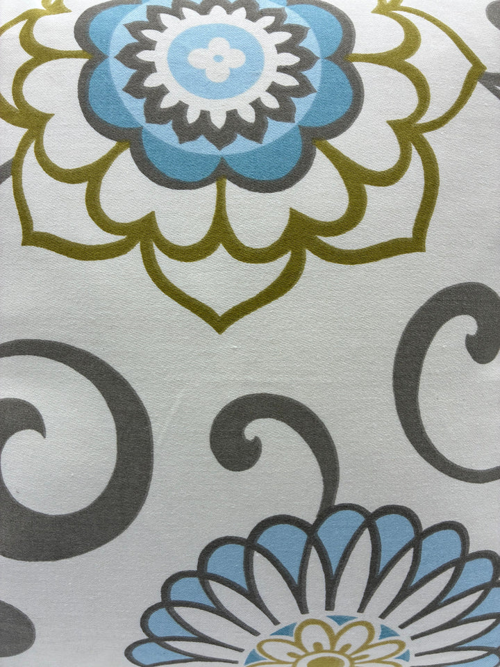 Close-up of Pom Pom Swirly Pillow Cover design