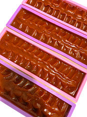 Close-up of soap bars in molds