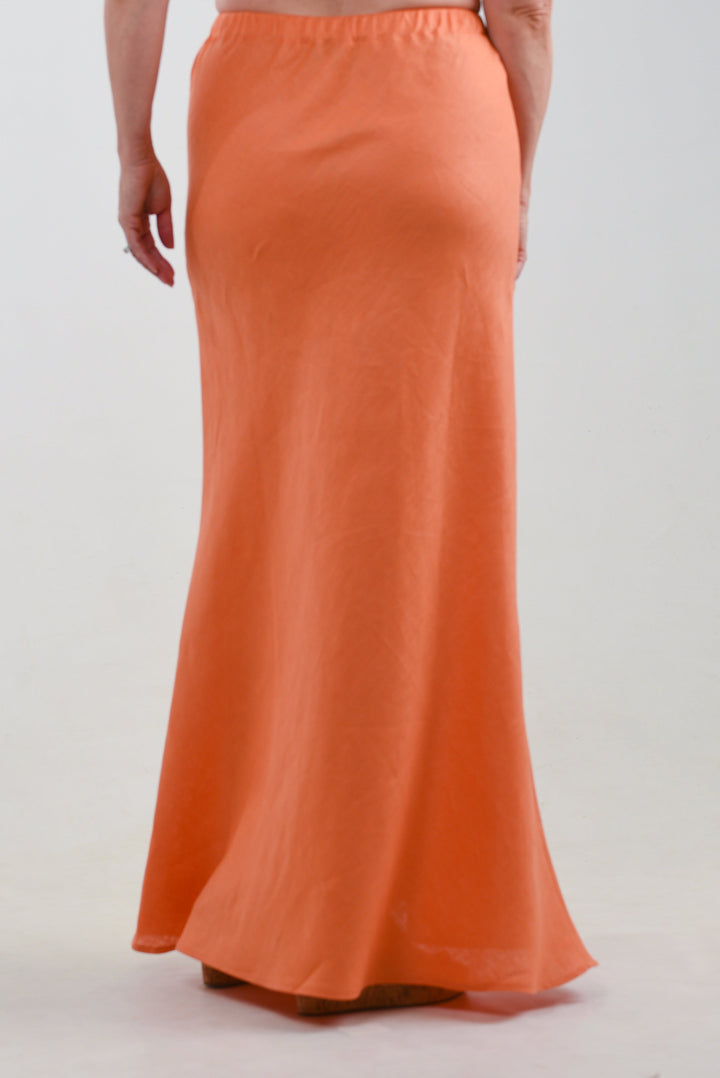 Back view of a flattering orange maxi skirt
